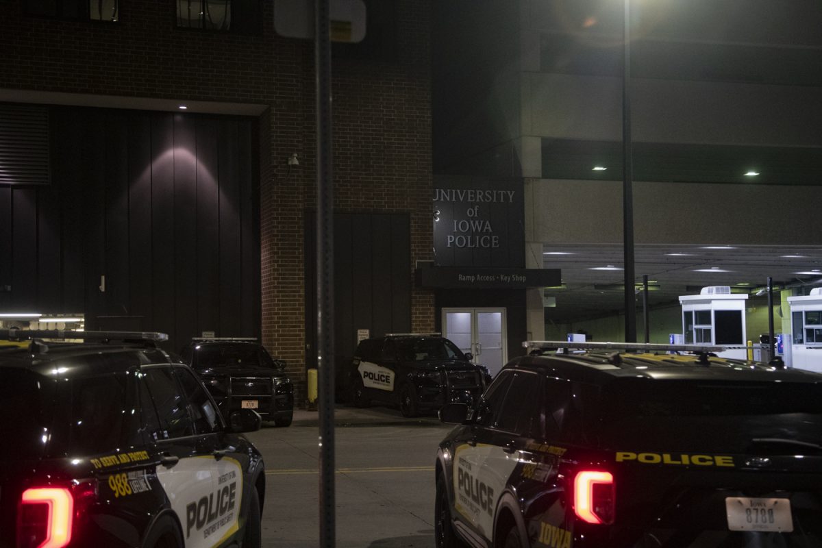 University of Iowa Police cars are seen outside of the Old Capitol Mall in Iowa City on April 16, 2024.