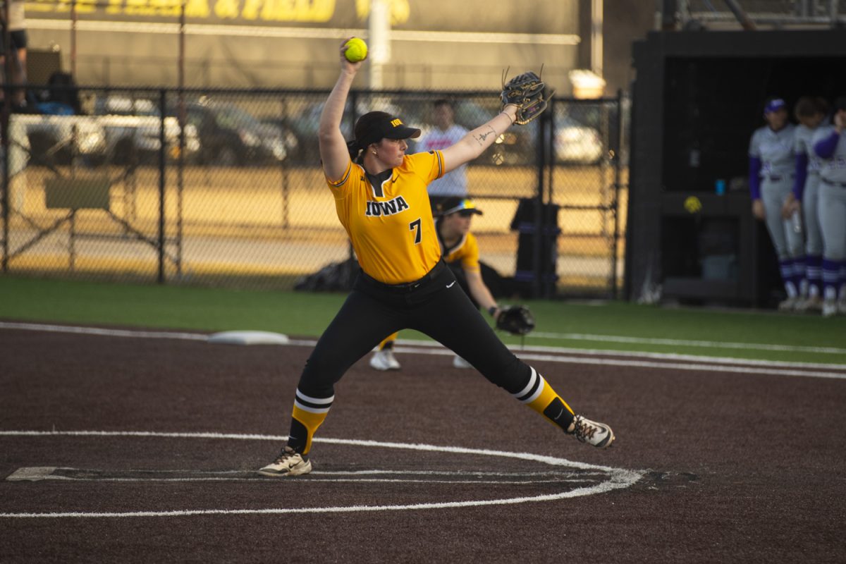Iowa pitcher Talia Tretton pitches during a women's softball game between Iowa and St. Thomas at Bob Pearl Softball Field in Iowa City on Mar. 12, 2025. The Hawkeyes defeated St. Thomas, 1-0.