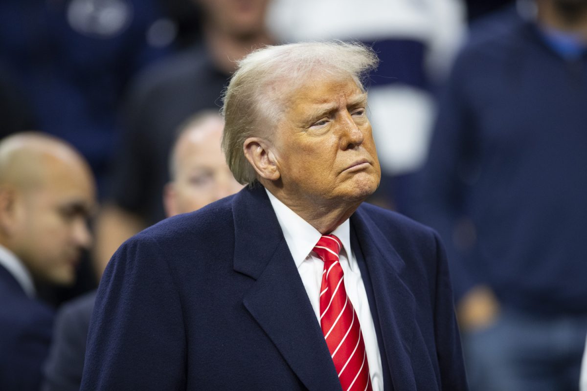 President Donald Trump watches during finals of the NCAA Men's Wrestling Championship at Wells Fargo Center in Philadelphia, Pa., on Saturday, March. 22, 2025.